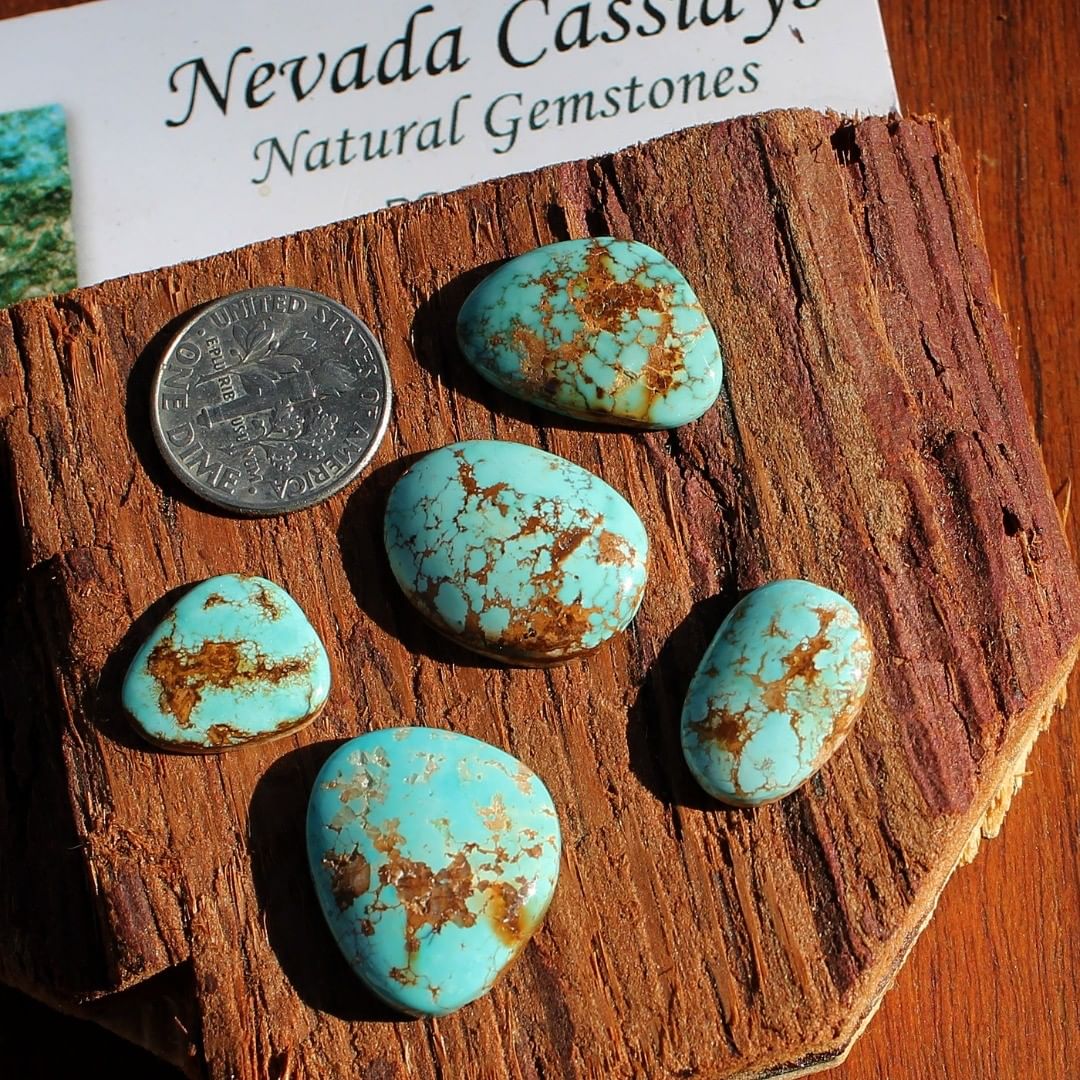 Blue with red, natural turquoise cabochons (Stone Mountain Mine)
Contact us  $112.28 for 13.2, 9.8, 7.5, 5.6, 4.0 carats un-backed & untreated Nevada turquoise.
