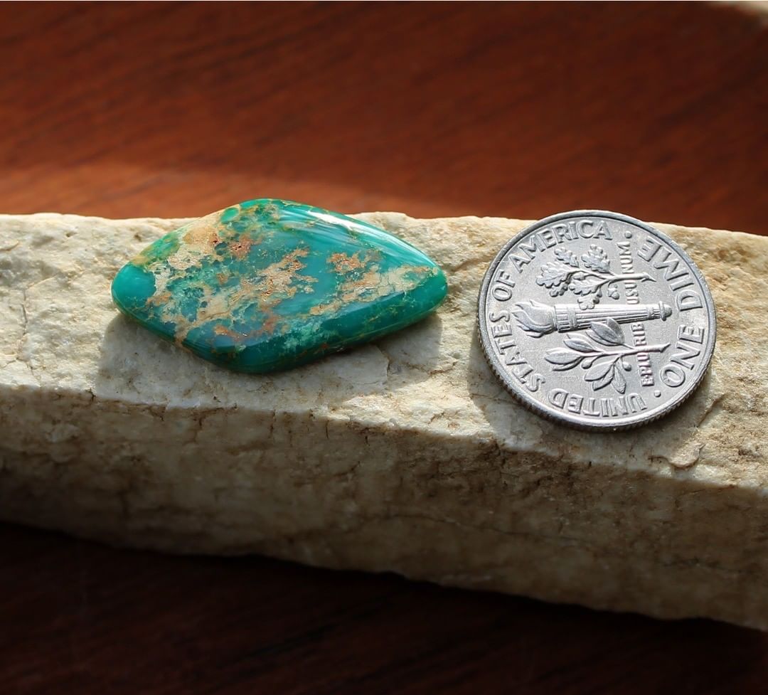 Deep blue Stone Mountain Turquoise cabochon
Instagram    $25.67 for 7.9 carats untreated & un-backed Nevada turquoise. 
