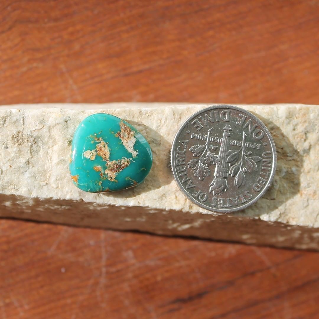 Deep teal Stone Mountain Turquoise cabochon
Instagram    $11 for 4.4 carats untreated & un-backed Nevada turquoise. 
