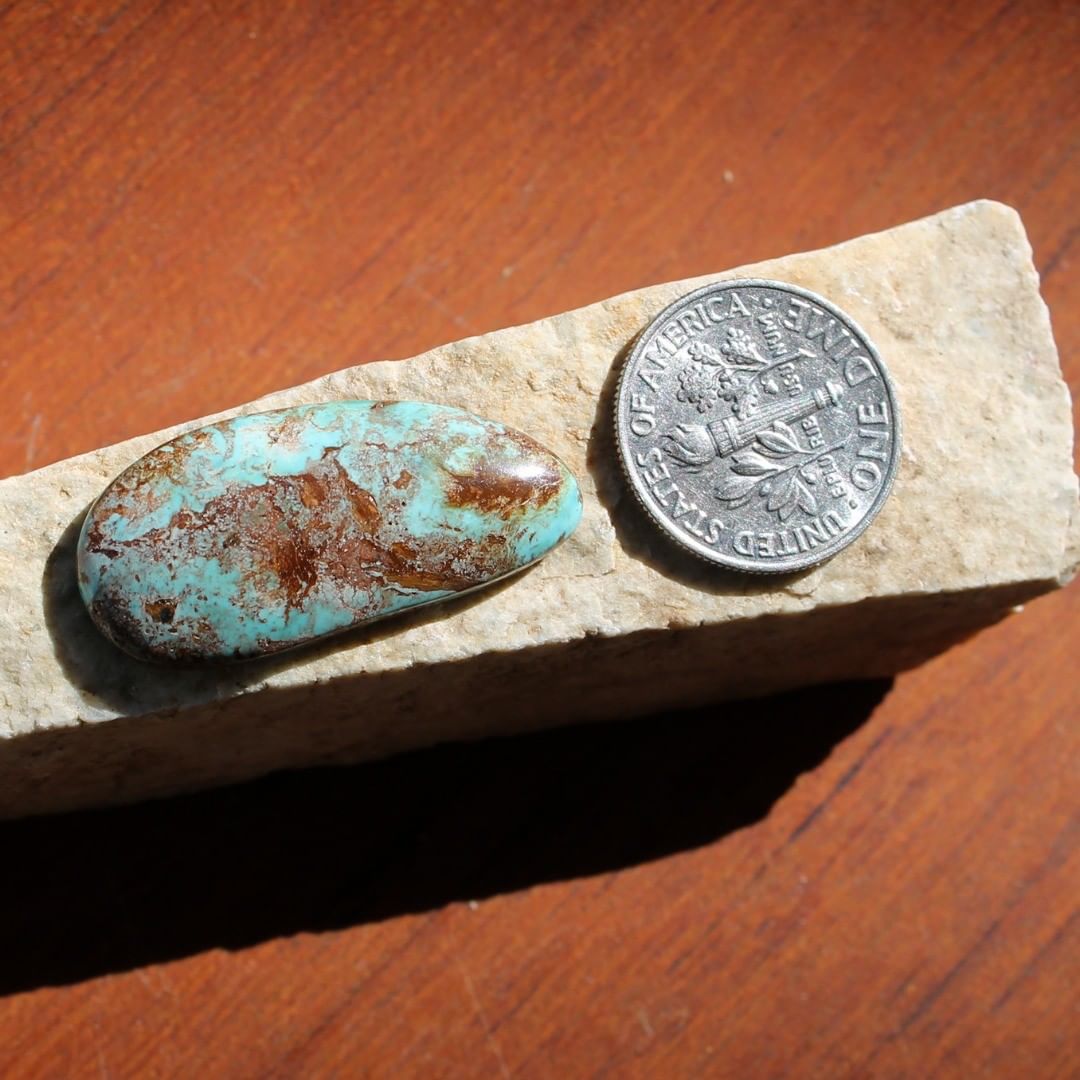 Light blue natural turquoise with red micro inclusions (Stone Mountain Turquoise)
Instagram    $41.40 for 13.8 carats untreated & un-backed Nevada turquoise.
