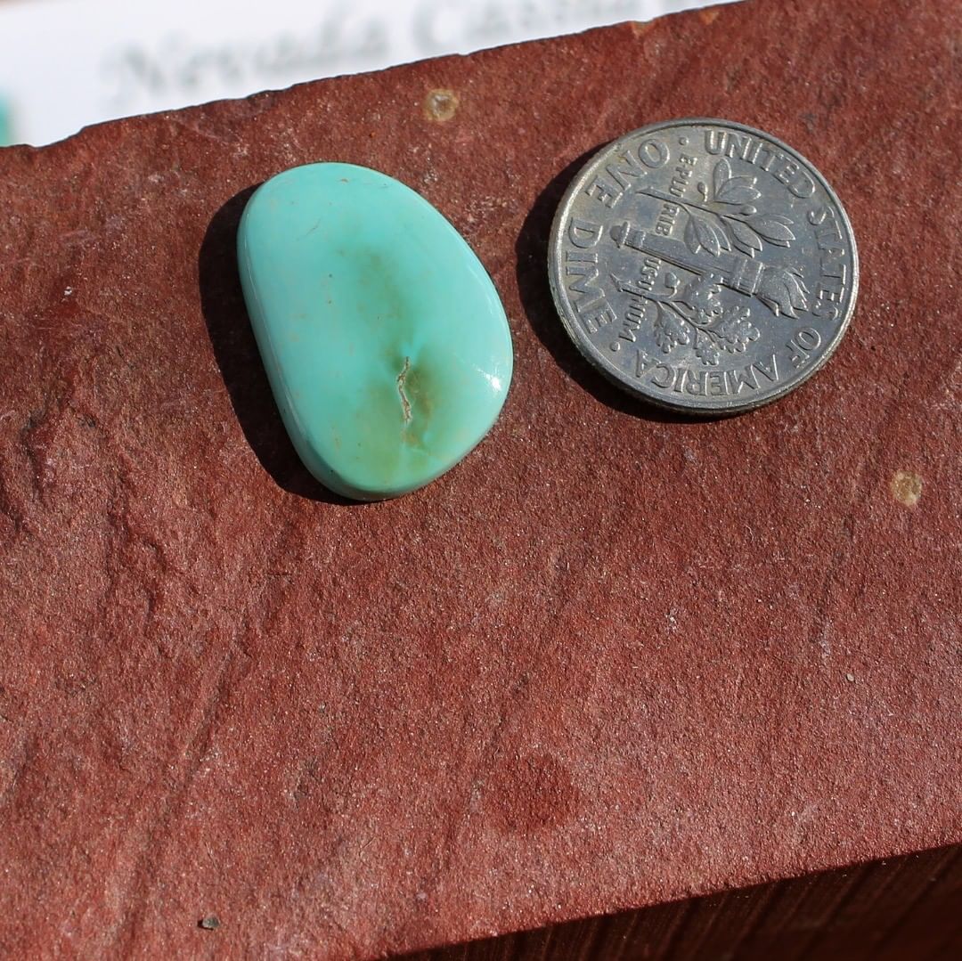 Light blue turquoise with inclusions (Stone Mountain Turquoise)
Contact us  $20.00  for 6.7 carats untreated & un-backed Nevada turquoise.

