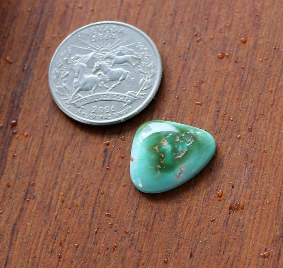 Multi color turquoise cabochon from Stone Mountain Mine
Contact us  $26.00 for 6.7 carats untreated Nevada turquoise 

