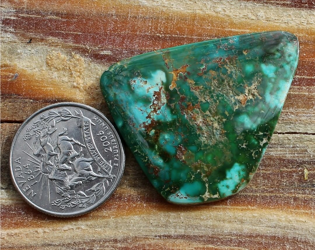 Polychrome Stone Mountain Turquoise Cabochon
Instagram    $125 for 44 carats untreated Nevada turquoise. This cab has some hostrock backing.
