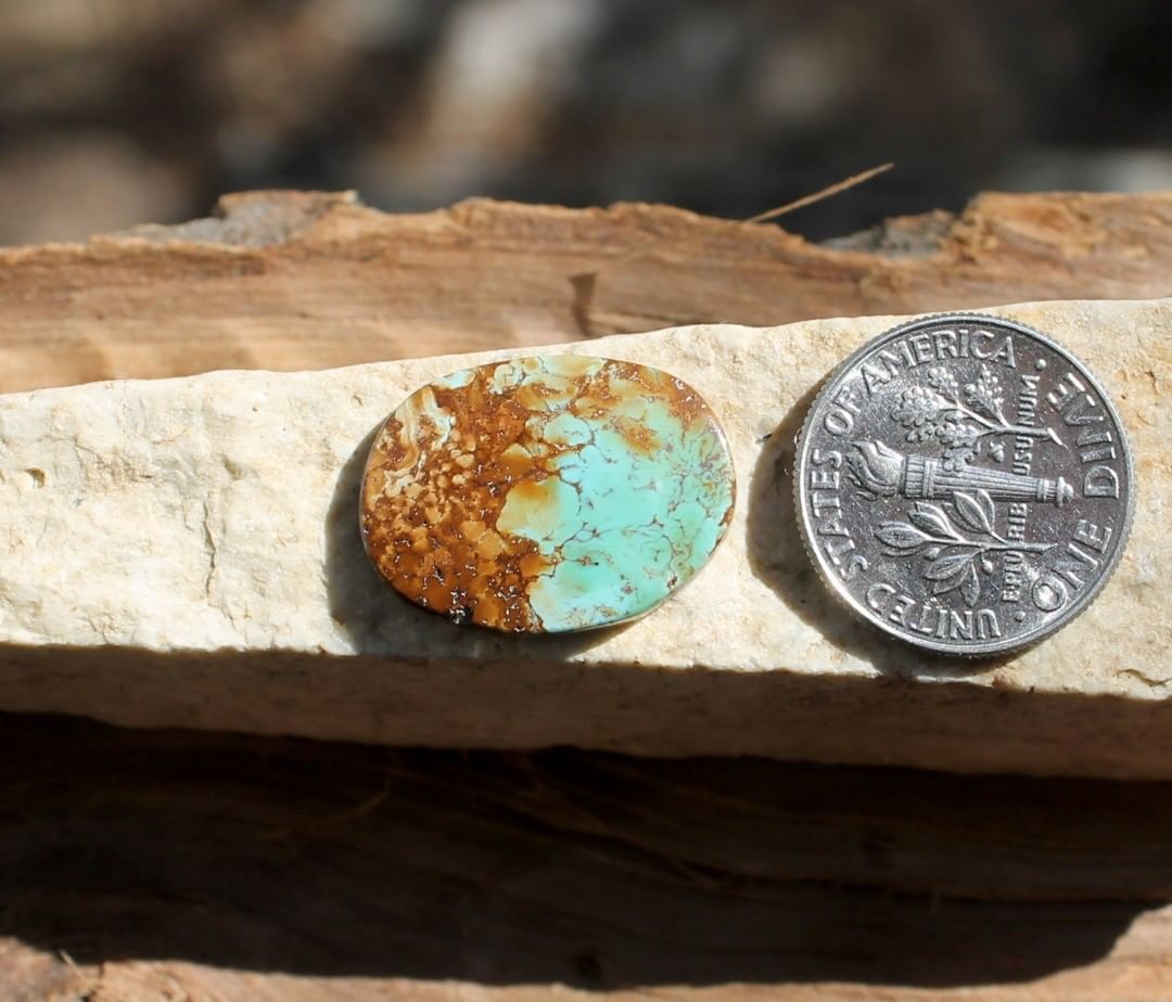 Natural blue Stone Mountain Turquoise cabochon w/ red inclusions
Instagram    $20 for 6.7 carats untreated & un-backed Nevada turquoise.
