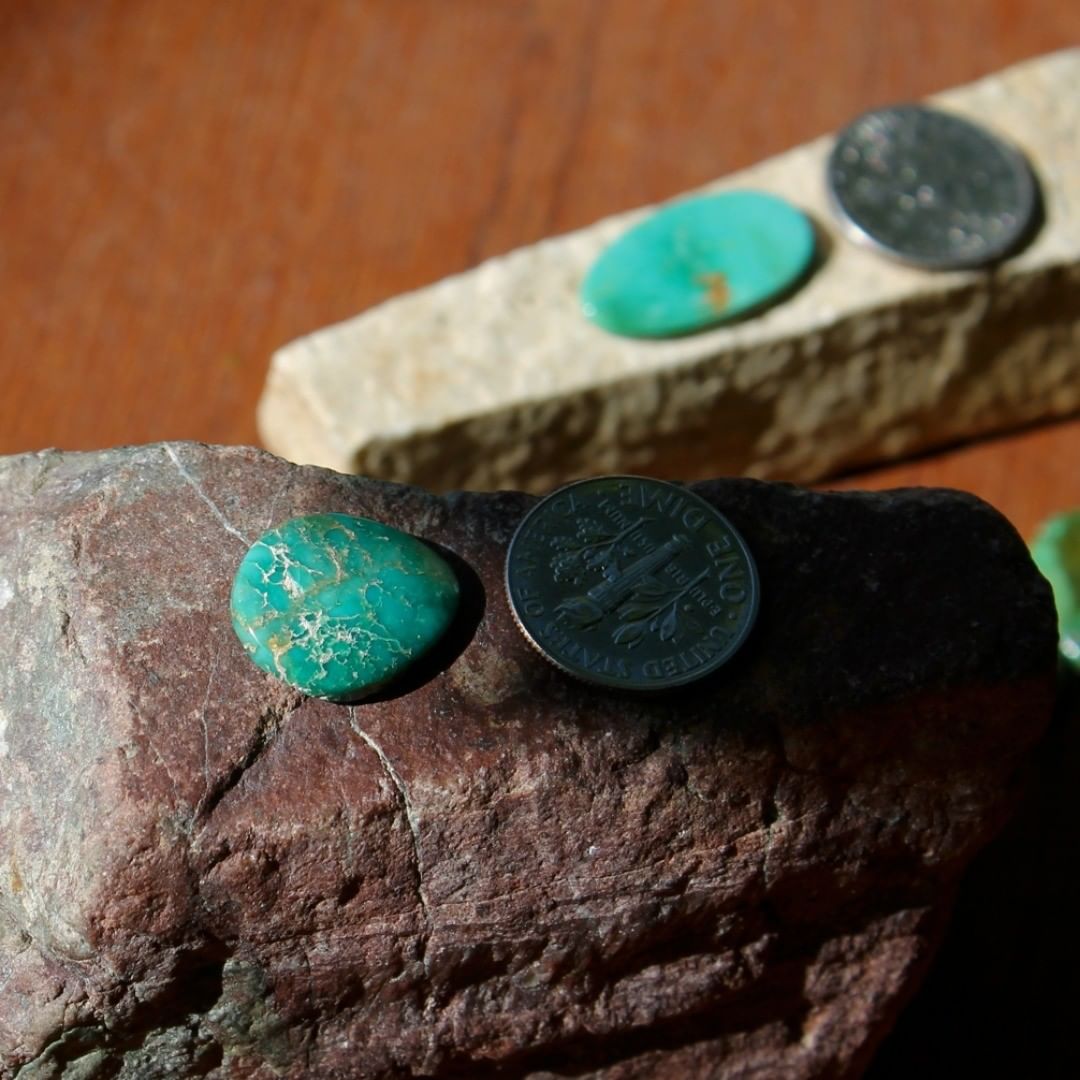 A natural green-teal Stone Mountain Turquoise cabochon
 $15 for 5.6 carat untreated & un-backed Nevada turquoise.
