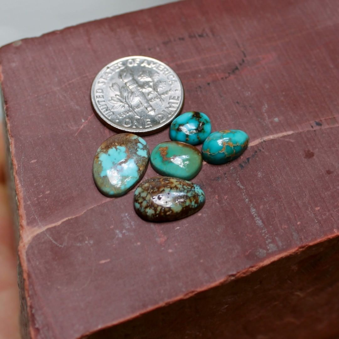 Five natural blue Stone Mountain Turquoise cabochons w/ rare inclusions
 $29 for 2.6, 2.5, 1.6, 1.6 & 1.0 carats untreated & un-backed Nevada turquoise.
