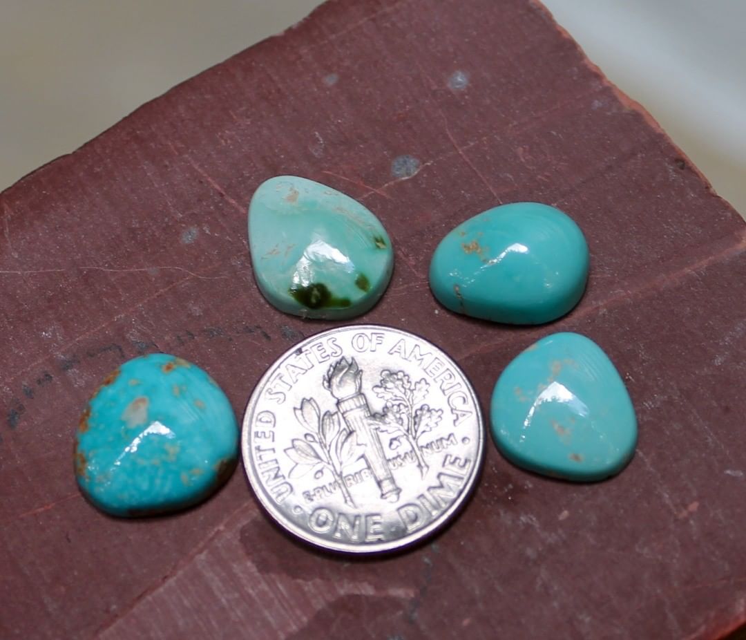 Four natural blue Stone Mountain Turquoise cabochons w/ various shades
 $42 for 4.9, 4.3, 3.1 & 2.9 carats untreated & un-backed Nevada turquoise.
