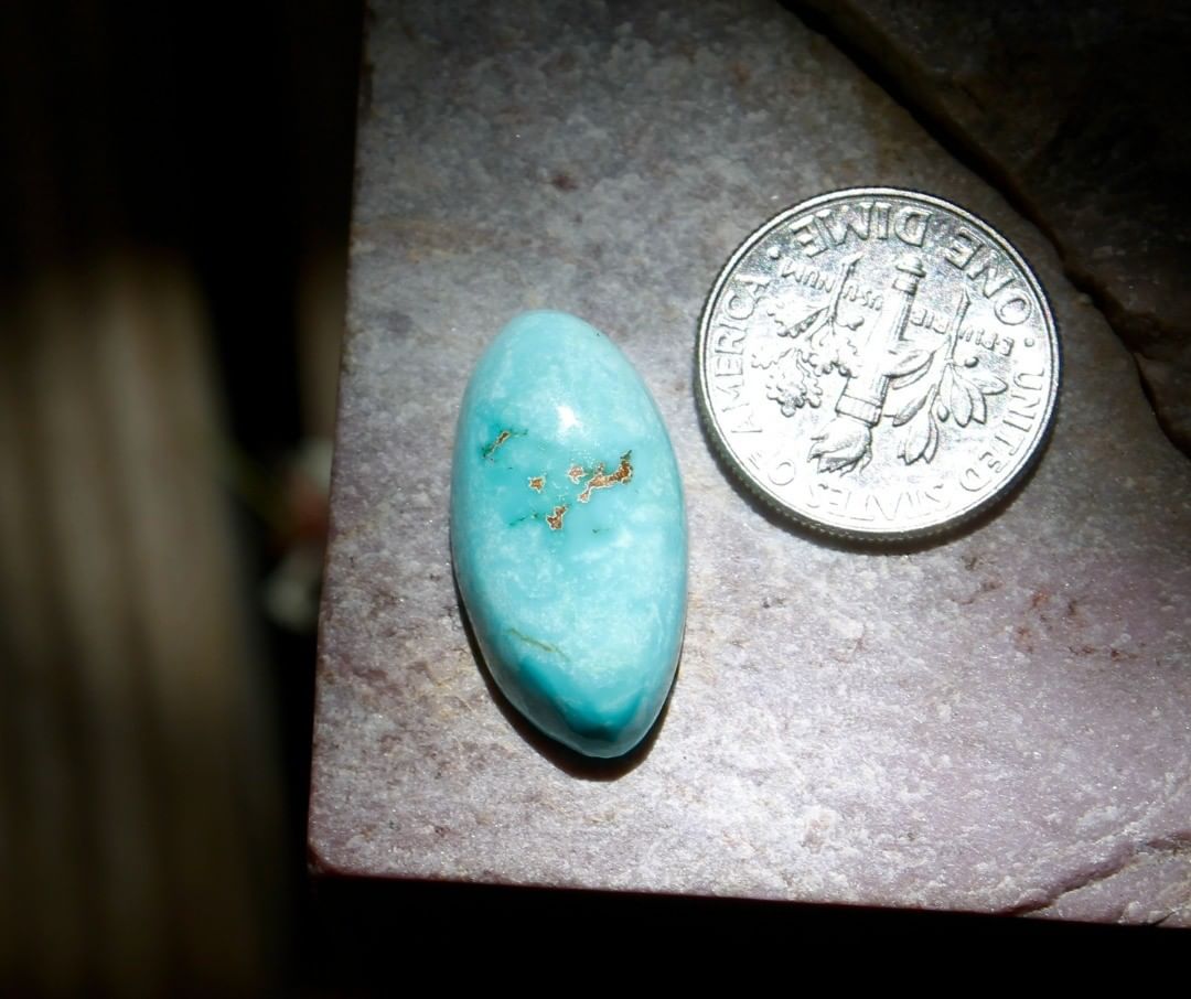 Natural blue Stone Mountain Turquoise cabochon w/ high dome
 $36 for 12.4 carats untreated & un-backed Nevada turquoise. 
