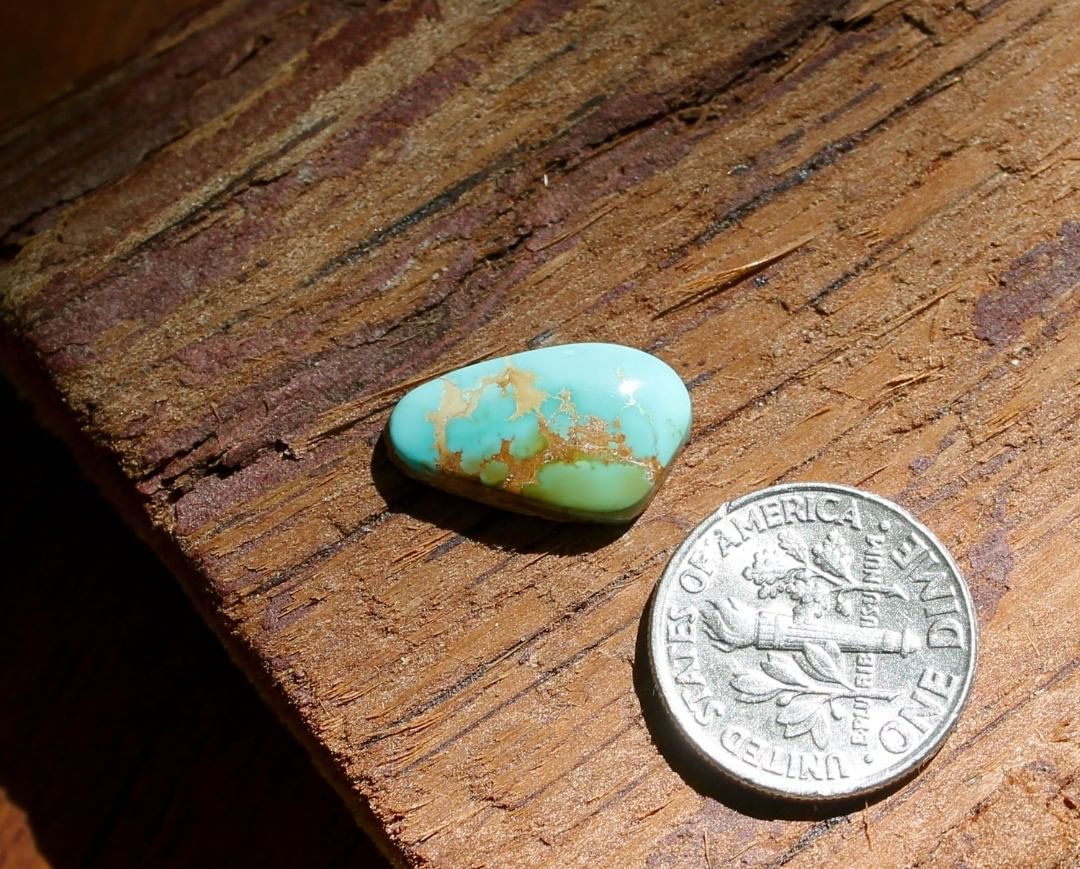 Natural blue Stone Mountain Turquoise cabochon
 $12 for 4.4 carats untreated & un-backed Nevada turquoise. 
