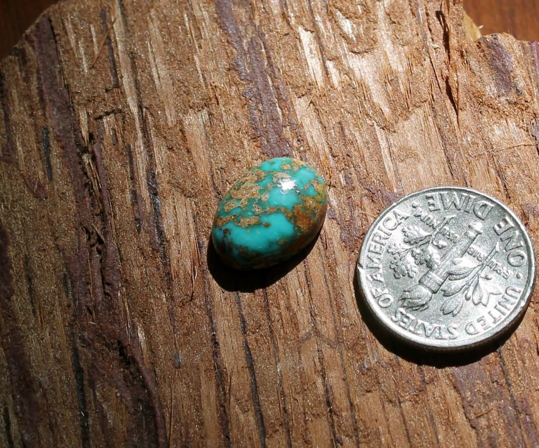 Natural blue turquoise cabochon w/ red quartzy matrix (Stone Mountain Turquoise)
 $14 for 4.8
