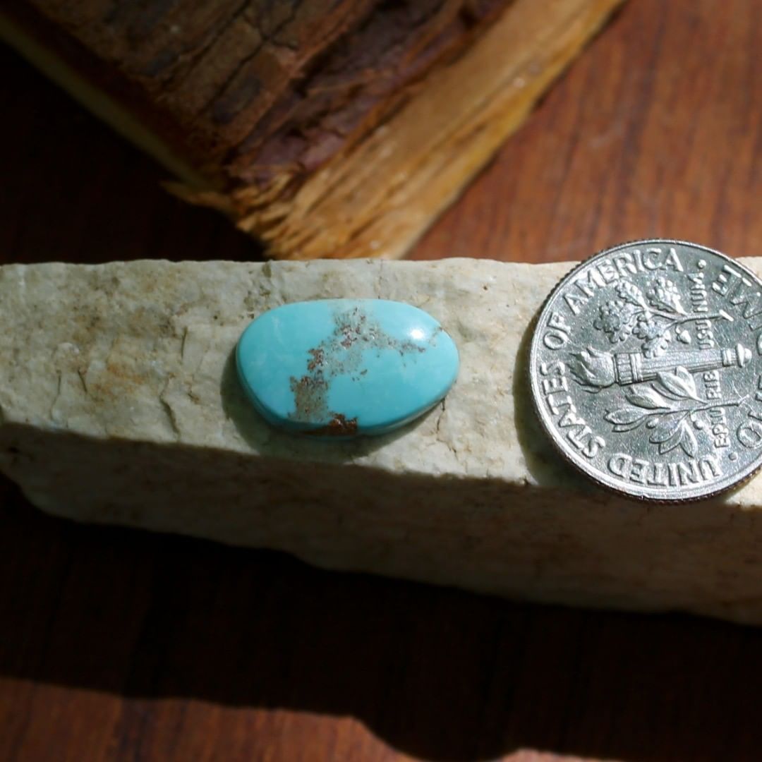 Natural blue turquoise cabochon w/ red inclusions (Stone Mountain Turquoise)
 $8 for 3.0
