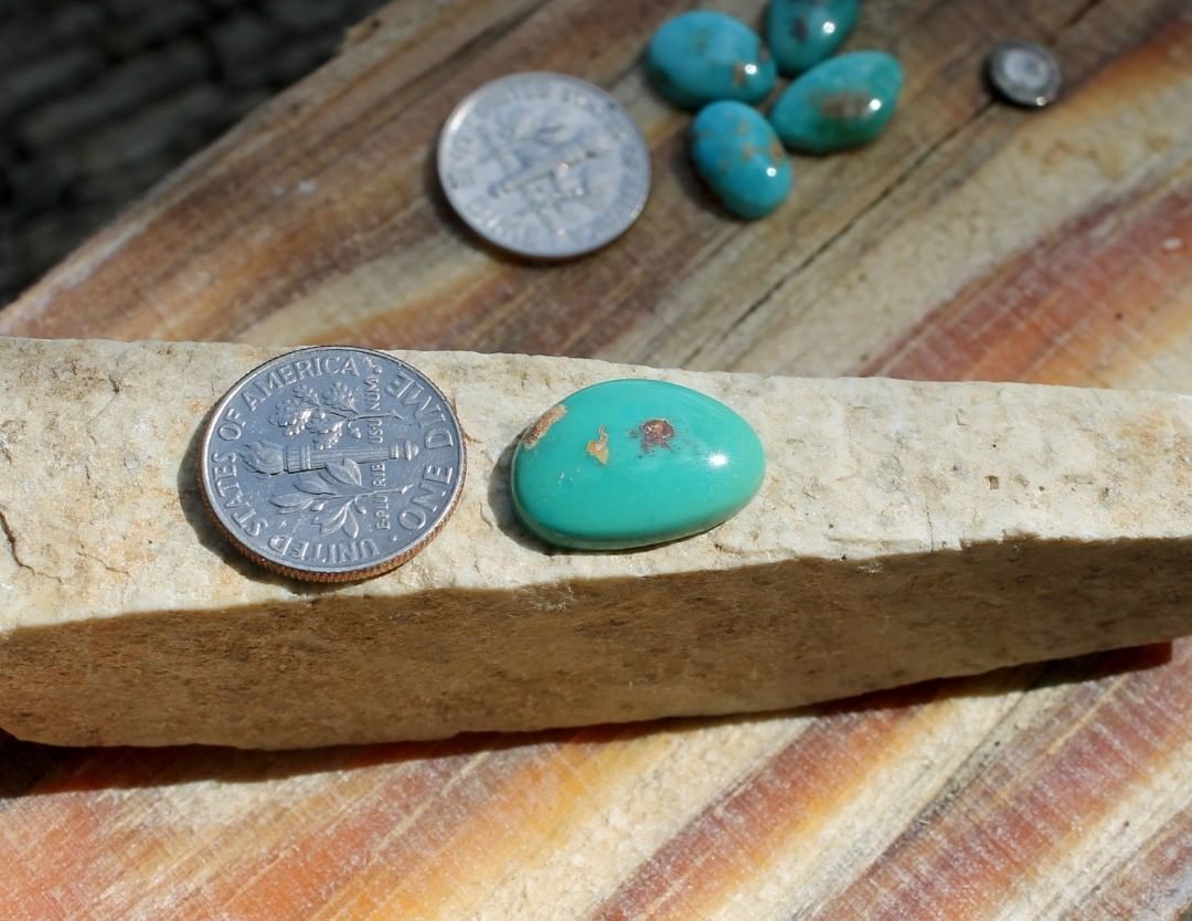 Natural Stone Mountain Turquoise cabochon
 $18 for 6.5 carats untreated & un-backed Nevada turquoise. 
