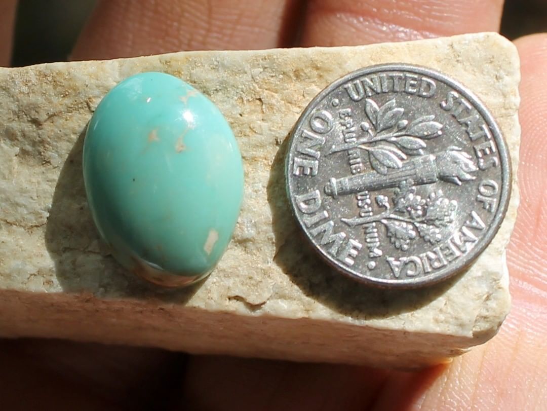 Natural Stone Mountain Turquoise cabochon w/ high dome
 $21 for 7.5 carats untreated & un-backed Nevada turquoise.
