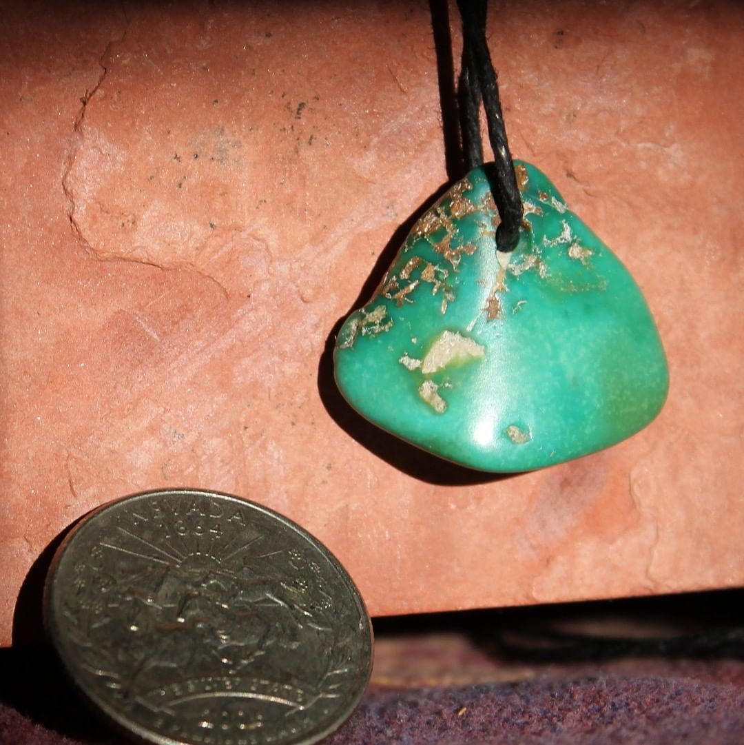 A chunky green Stone Mountain Turquoise pendant bead 
 $90 for 26.8 carats untreated Nevada turquoise.
25.8x23x5-8 mm with a 2 mm hole 
