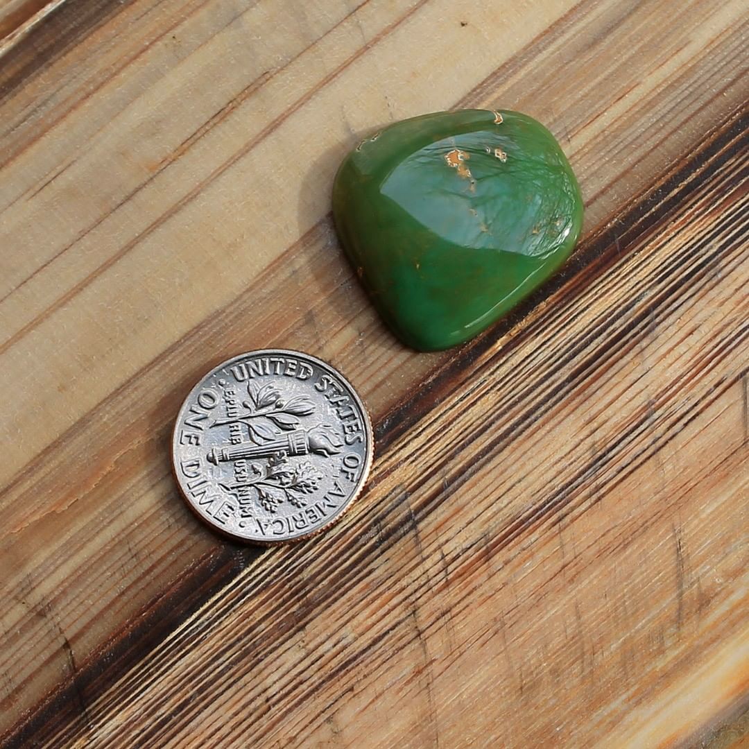 A foresty green Stone Mountain Turquoise cabochon
 $45 for 15.8 carats untreated & un-backed Nevada turquoise.
