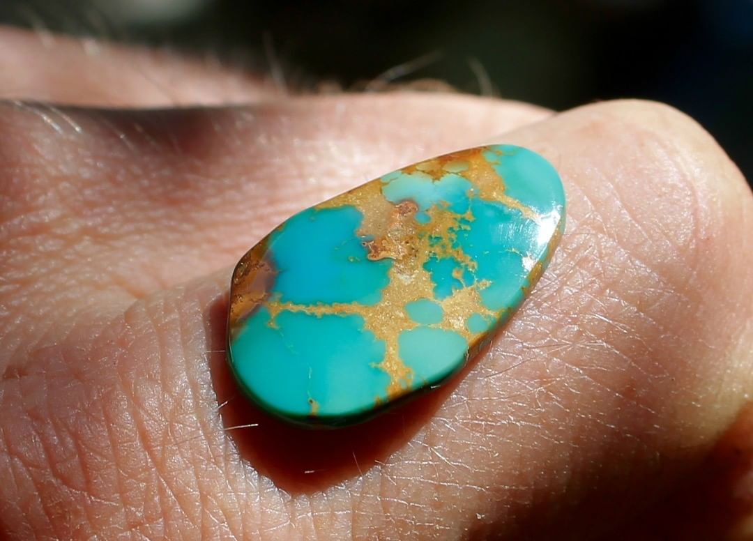 A green teal Stone Mountain Turquoise cabochon w/ interesting matrix
 $21 for 7.5 carats untreated & un-backed Nevada turquoise.

