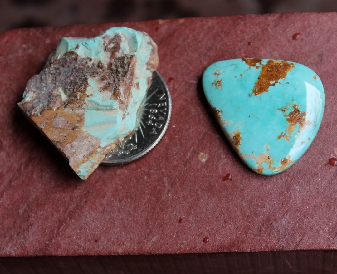 Blue Stone Mountain Turquoise cabochon w/ red matrix
 $44 for 16.0 carats untreated & un-backed Nevada turquoise.
