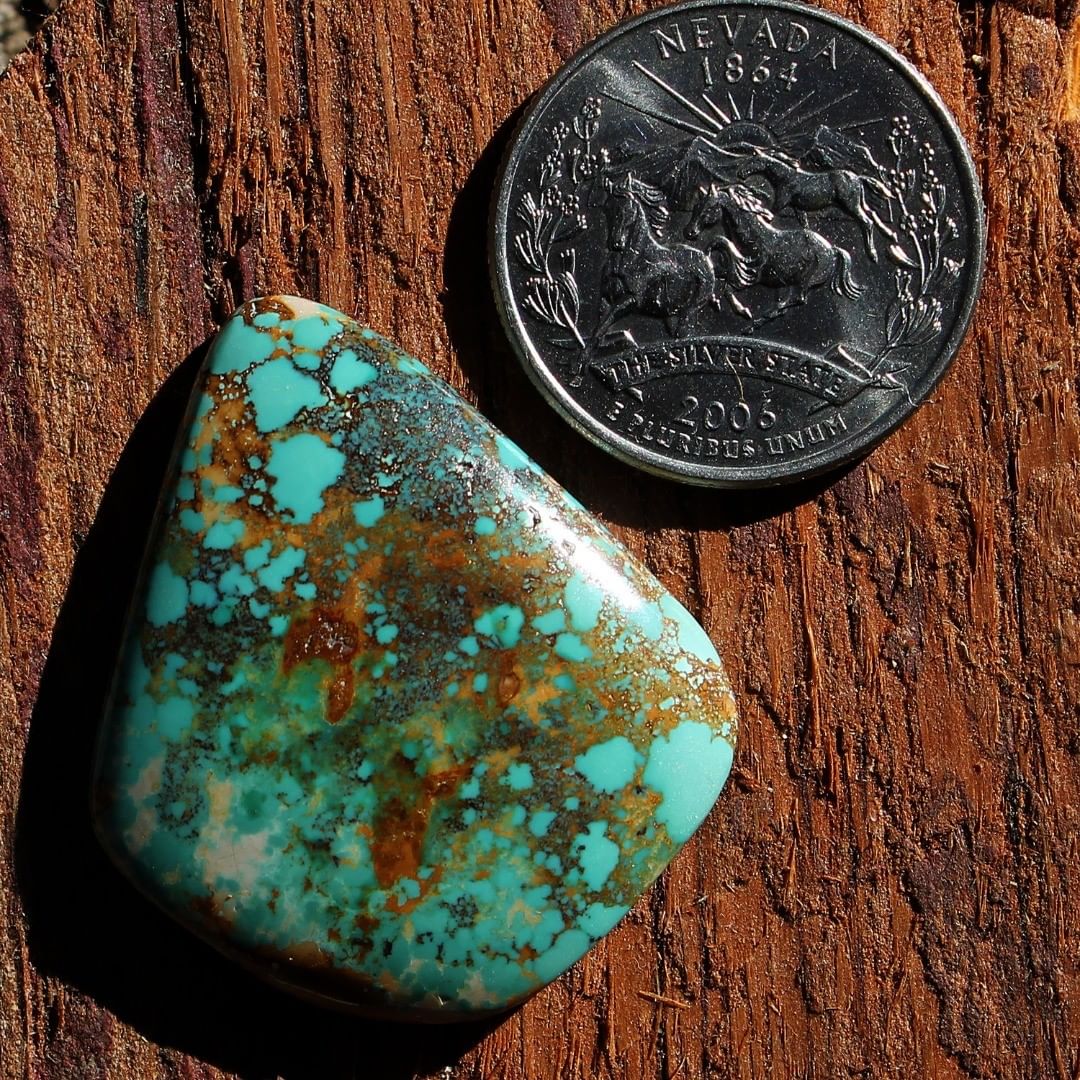 Large natural blue turquoise cabochon specimen from Taubert Hills
 $161 for 45.9 carats untreated & un-backed Nevada turquoise.
36.6×31.6×5.8 mm
A large turquoise vein specimen found at the Taubert Hills deposit near Yerington Nevada, fashioned into a stunning blue turquoise cabochon specimen with red spiderweb matrix. This turquoise cabochon is un-backed, solid and untreated.
