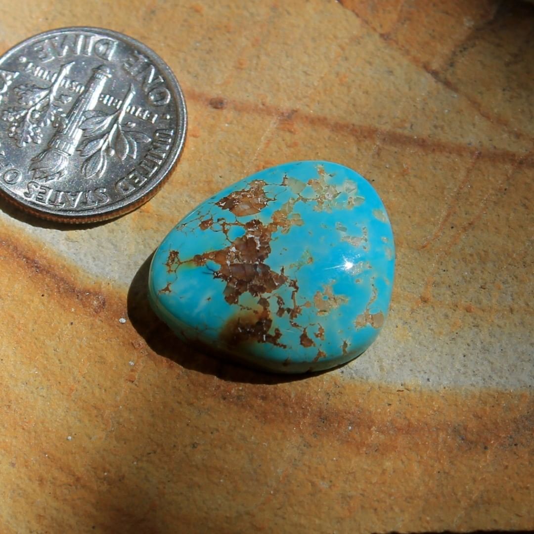 Natural blue Stone Mountain Turquoise cabochon w/ iron infused quartz matrix
 $39 for 13.2 carats untreated & un-backed Nevada turquoise

