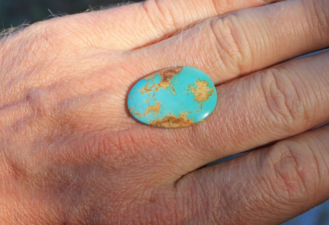 Natural blue Stone Mountain Turquoise cabochon
 $34 for 12.9 carats untreated & un-backed Nevada turquoise. 
