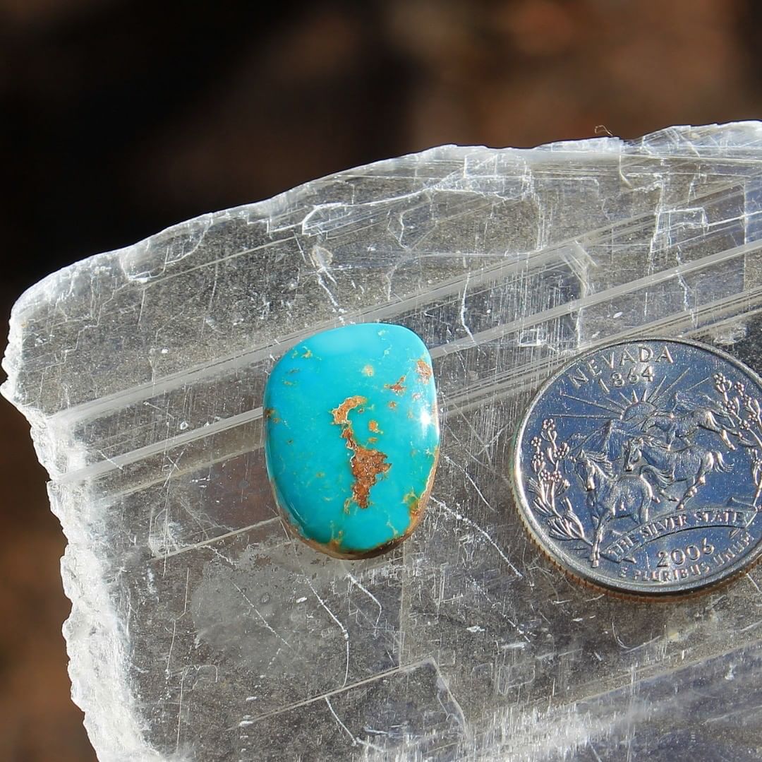 Natural blue Stone Mountain Turquoise cabochon w/ red matrix
 $30 for 10.8 carats untreated & un-backed Nevada turquoise.
