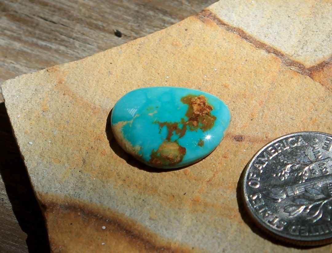 Natural blue Stone Mountain Turquoise cabochon w/ iron inclusions
 $14 for 5.2 carats untreated & un-backed Nevada turquoise
