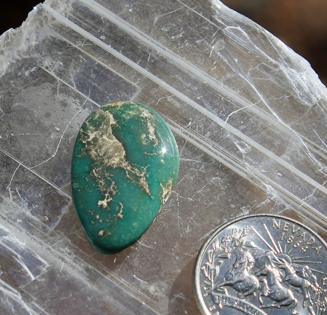 Natural teal-green Stone Mountain Turquoise cabochon 
 $36 for 13.5 carats untreated & un-backed Nevada turquoise.
