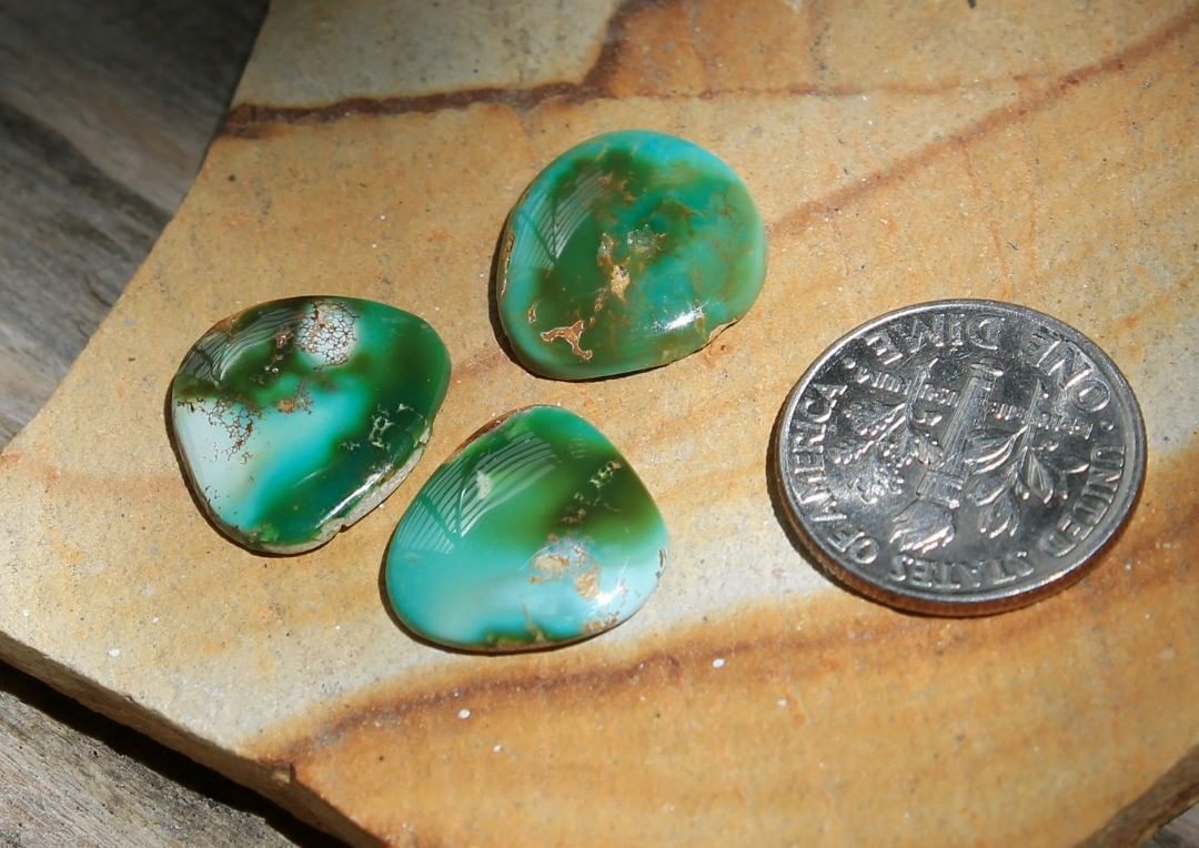 Three multi colored cabochons with a lot of close-up drama, untreated. 

$28 for 4.3, 3.7 & 3.5 carats
