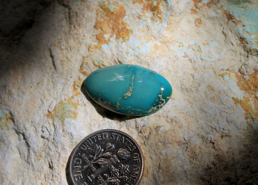 A deep teal cabochon. This natural is from rare vein that only produced a small amount.

$22 for 8.1 carats un-backed & untreated