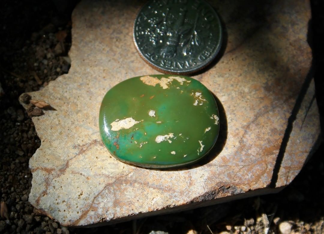 A natural green cabochon with lush color. 

$42 for 14.8 carats un-backed and untreated