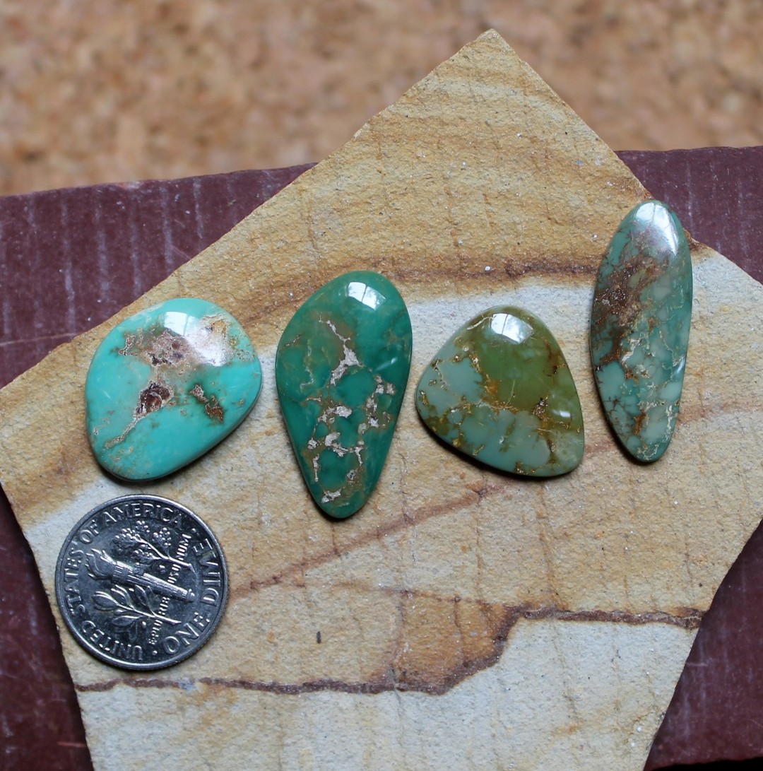 A variety in green for these natural Stone Mountain Turquoise cabochons