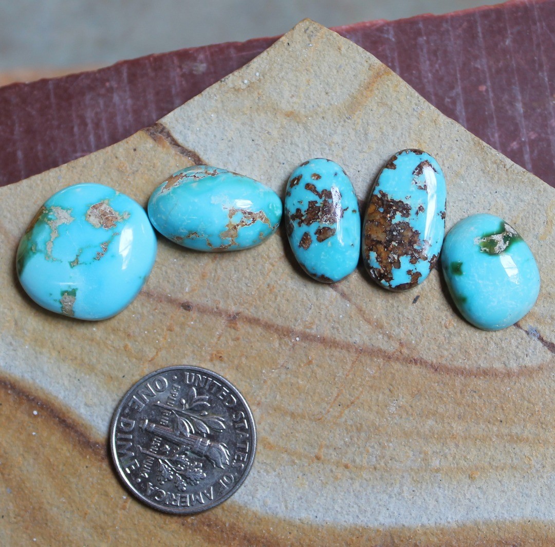 Blue with varying matrix for these natural Stone Mountain Turquoise cabochons